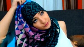Pretty Arabic woman shows off her big round booty and her perfect tits